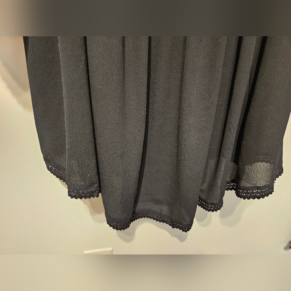 Black torrid dress with frill on sleeve